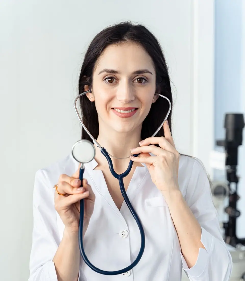 Ophthalmologist in the eye clinic beside examination equipment